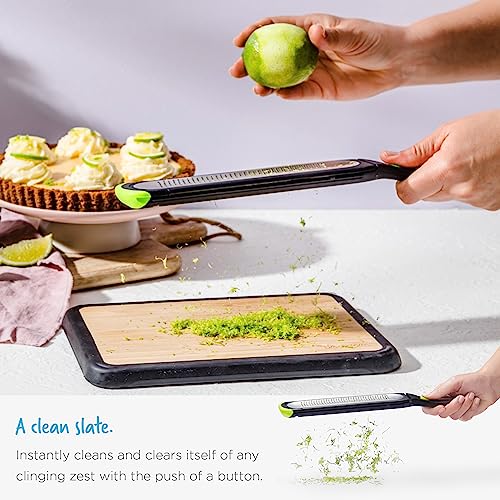 Dreamfarm Ozest Self-Cleaning POP-Button Zester for Fine, Fluffy Citrus Zest, Cheese, Nut, & Spices with Non-Slip Silicone Foot - 1mm Zester, Black/Green